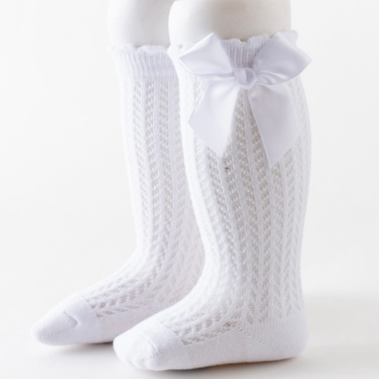 Sosete lungi cu fundita pentru bebeSosete lungi cu fundita pentru bebe